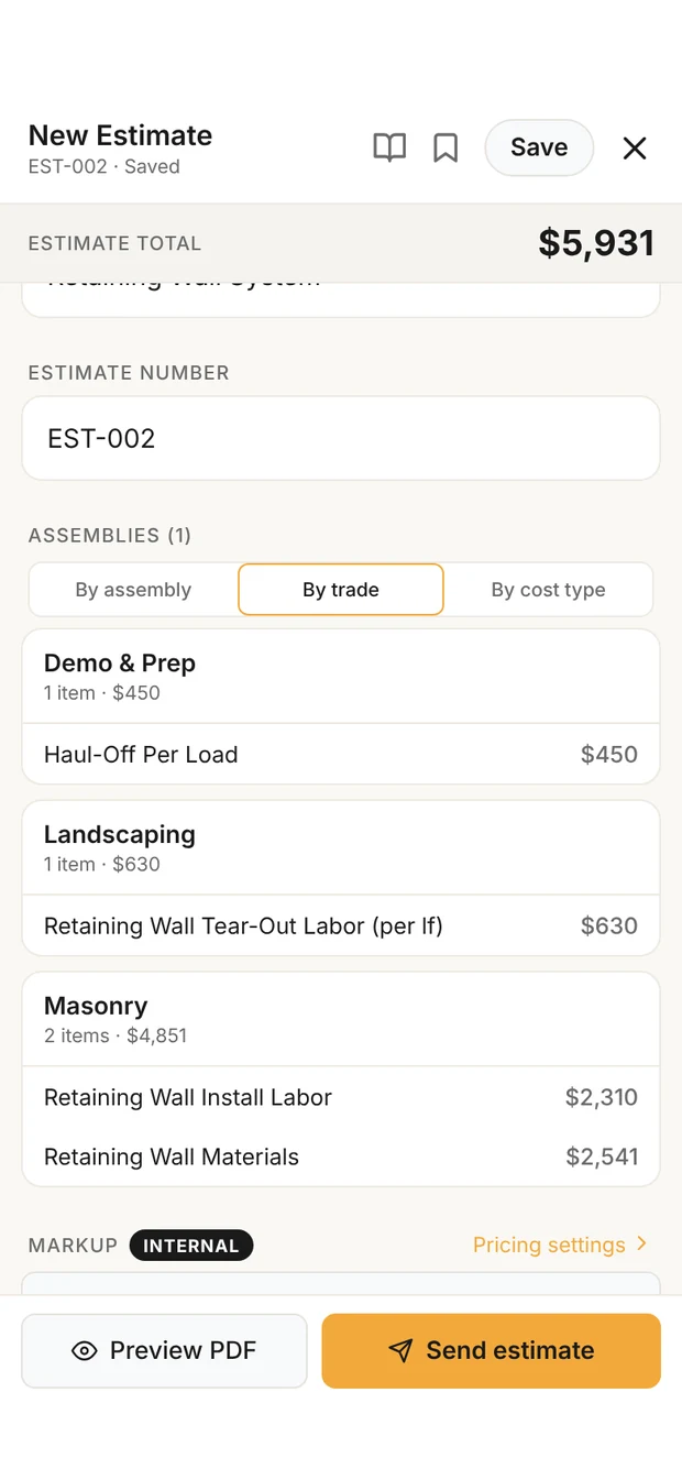 The retaining wall estimate in Clamp's builder: total $5,931, with tear-out, block, materials and haul-off